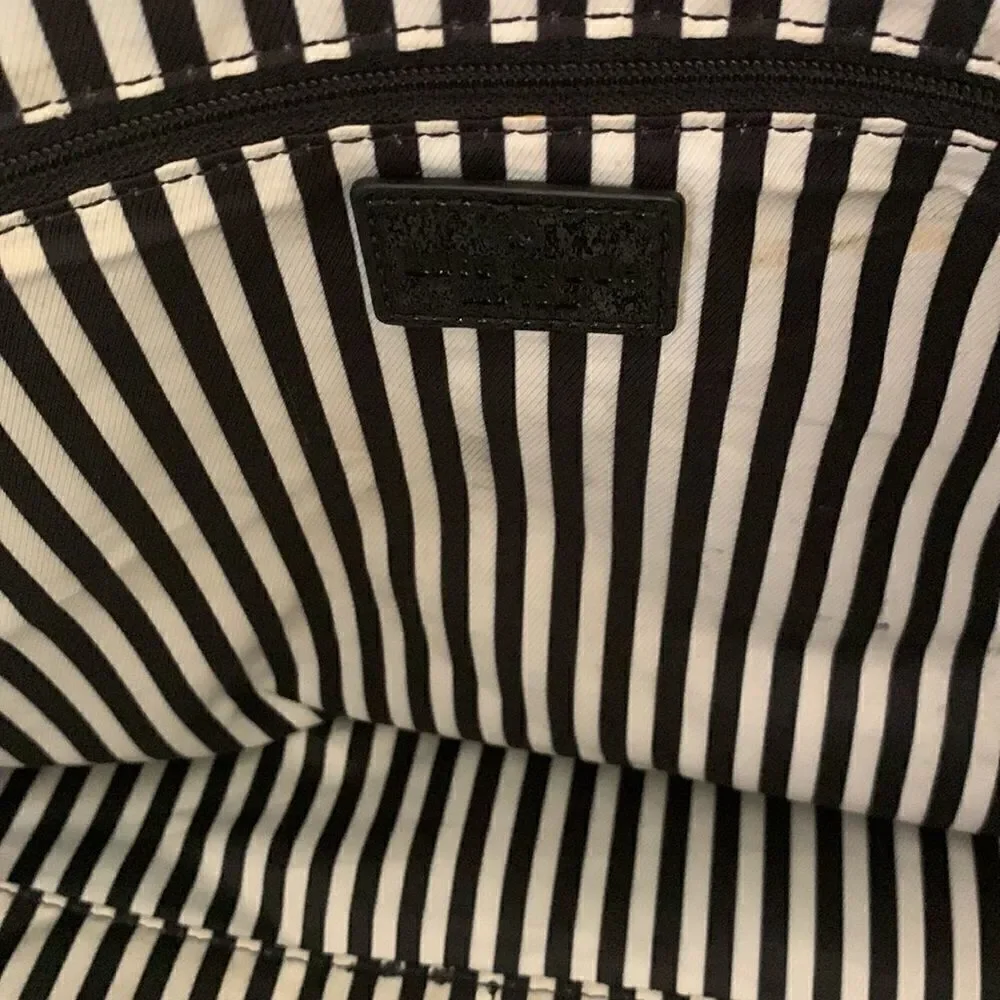 Kate Spade black leather tote bag with exterior and interior pockets